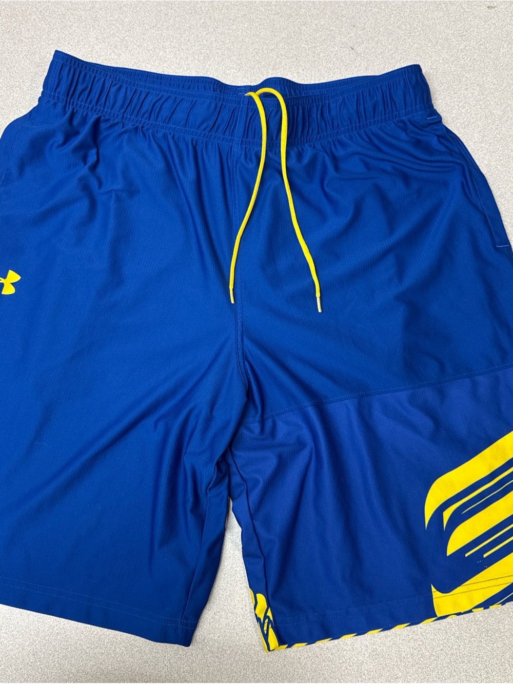 Stephen Curry Under Armour Men's Blue Athletic Shorts with Yellow Accents